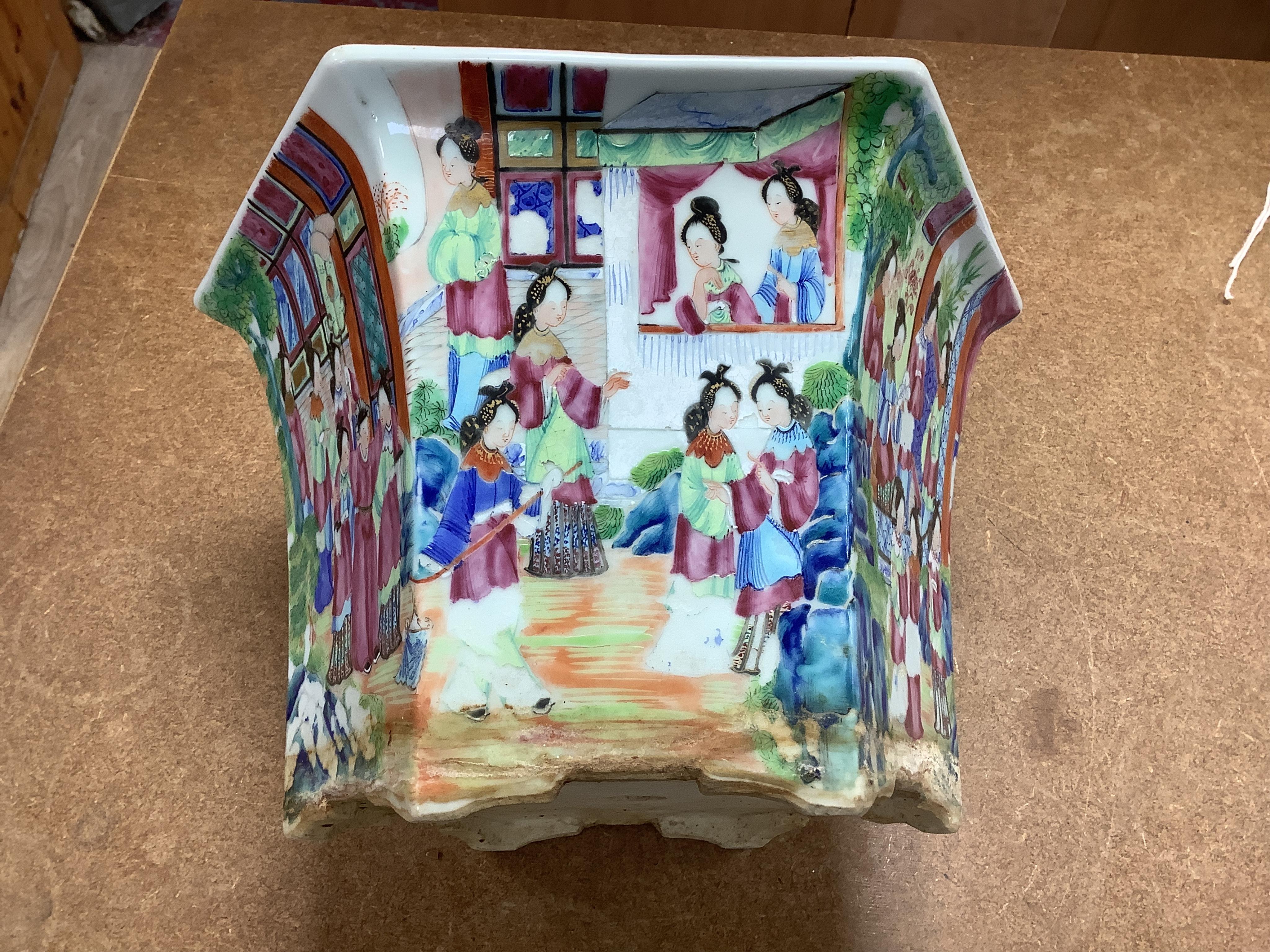 A 19th Chinese Canton decorated famille rose hexagonal planter, with stand, the stand cracked, 19.5cm total. Condition - fair